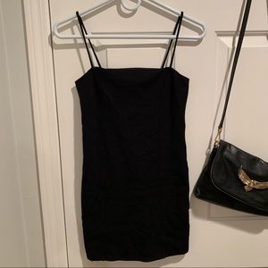 Black mini bodycon dress.